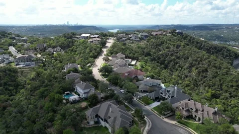 Far west hills with cloudy shadows overhead drone views of water in distance Video stock 252790438