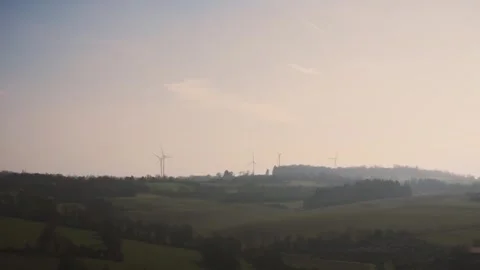 Far Windturbine Sunset Video stock 301980138
