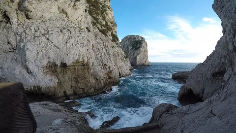 Faraglioni of Capri at sunset 스톡 동영상 106400540