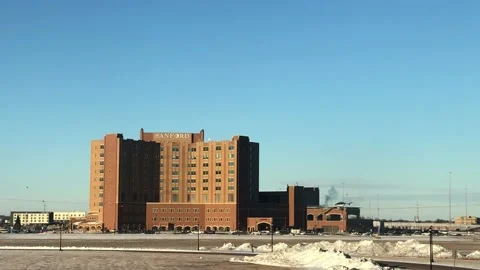 FARGO ND  3 DEC 2022: Sanford Hospital and blue sky. Stock Footage 230056334