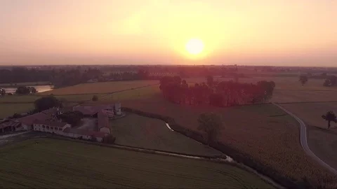 Farm and fieds at sunrise - aerial Stock Footage