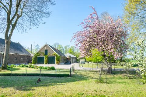 Farm with Barns in Spring Stock Photos