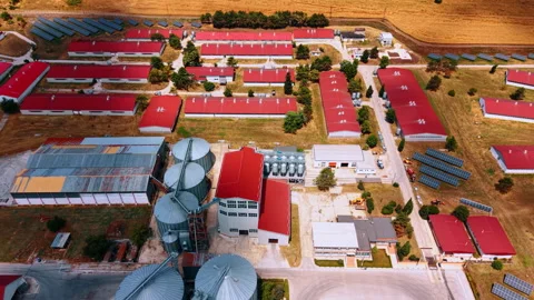 Farm complex with grain silos and solar arrays Video stock 340079568