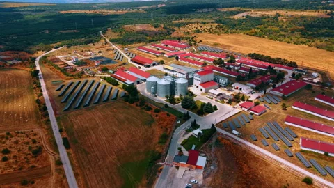 Farm complex surrounded by fields and solar arrays Stock-Footage 340079577