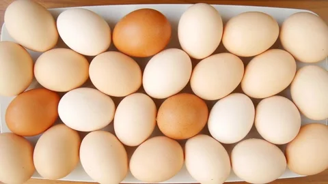 Farm eggs on a plate. 스톡 동영상 328403275
