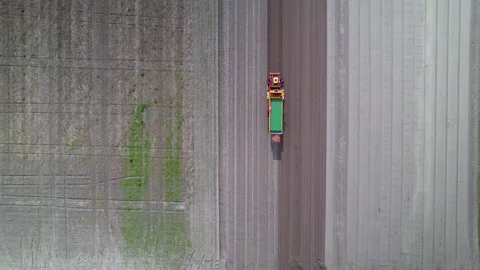 A farm equipment seeding the fields during spring time in the Netherlands c.. Video stock 274366463