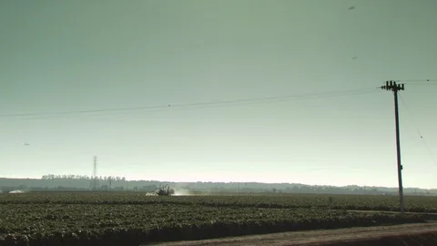 Farm Fields Spraying Water and Pesticides Stock Footage 123777824