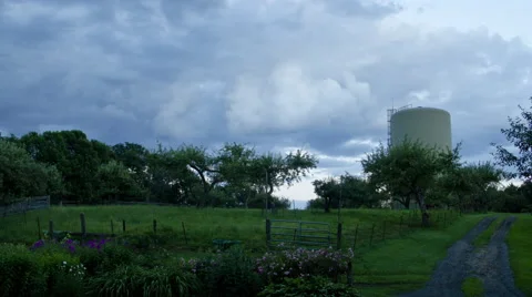 Farm Sunset with Clouds Stock Footage 68956902