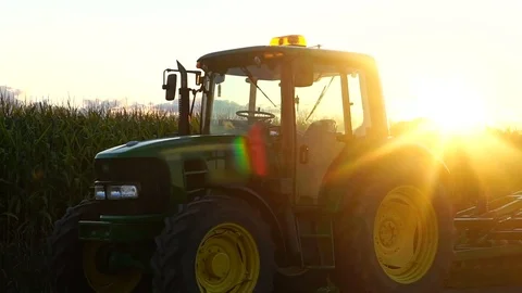 Farm Tractor Parked During Sunset Video stock 80390448