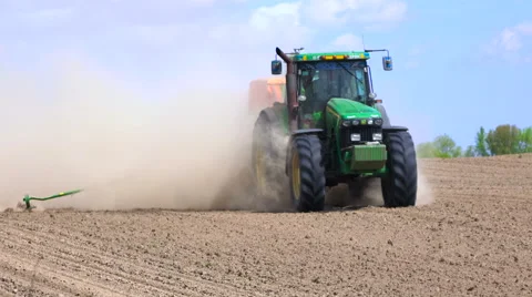 Farm tractor with planter Stock Footage 62929964