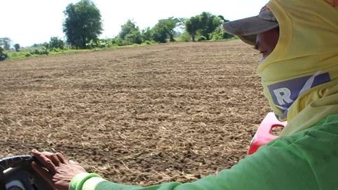 Farm tractor plowing field Video stock 108911400