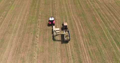 Farm tractor working on the field Video stock 75453747