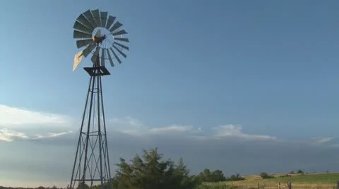 Farm Windmill in slight breeze - wide shot Stock Footage 8959415