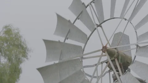 Farm windmill in the wind Stock Footage 74063603