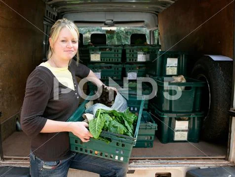 Farm Worker Loading Van