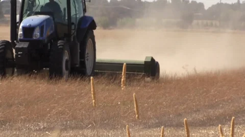 Farmer and tractor in field Stock Footage 28834547