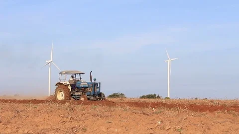 Farmer are using tractor on a field. Stock Footage 83578601