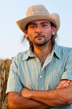 Farmer with Arms Folded Looking at Camera Stock Photos
