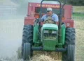 Farmer Baling Hay SD Footage
