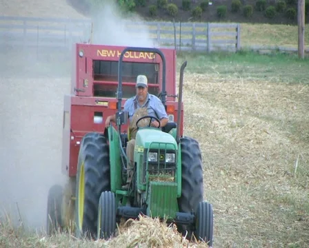 Farmer Baling Hay Stock Footage 4110719