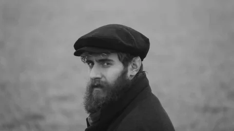 Farmer  with Beard Looks At Camera Stock Footage 72980005