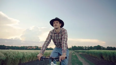 Farmer on bicycle Stock Footage 109050517