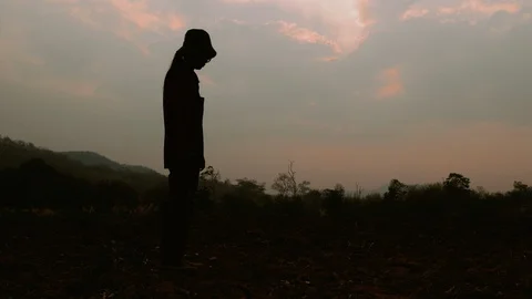 Farmer is checking soil quality before sowing wheat. Male hands touching soil on Stock Footage 125480145