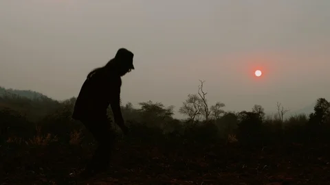 Farmer is checking soil quality before sowing wheat. Male hands touching soil on Stock Footage 125481074