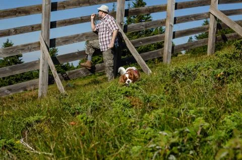 Farmer with a dog Stock Photos