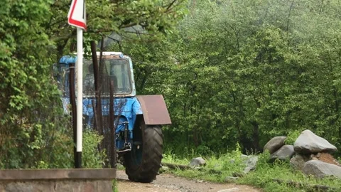 The farmer drives a tractor 스톡 동영상 317341765