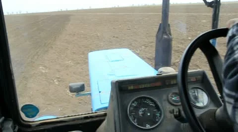 Farmer driving tractor Video stock 22305125