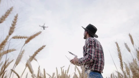 Farmer with drone Stock Footage 110818015