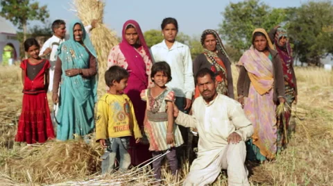 Farmer family in India, medium shot, shallow DOF Stock Footage