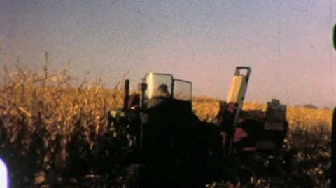 Farmer Harvests Corn Crop Combine Tractor 1960s Vintage Film Home Movie 8mm 스톡 동영상 8992528