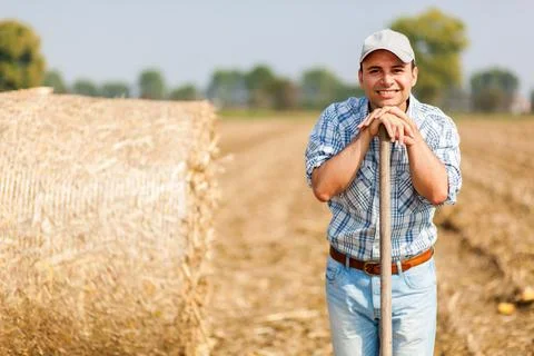 Farmer holding a pitchfork 写真素材