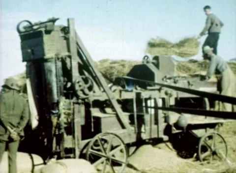 Farmer Making Hay Bales (1940s) Stock Footage 155336578