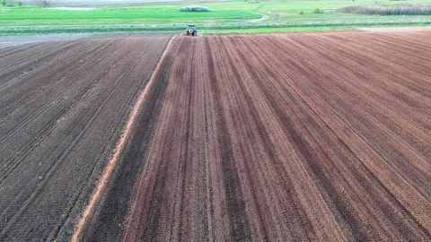 Farmer plowing field with a seed bad 库存影片 88400897