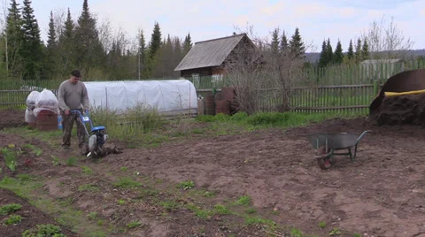 Farmer plowing Stock Footage 39674134
