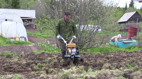 Farmer plowing Stock Footage 39674155