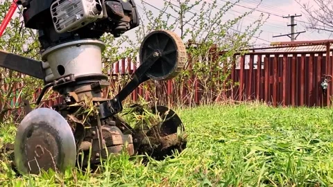 Farmer plowing soil with plowing machine Stock Footage 152854353