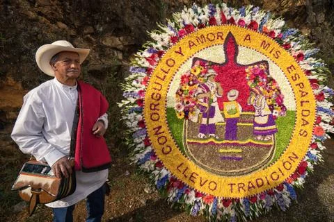 Farmer is posing with floral display Stock Photos