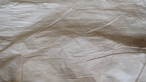 The farmer pour oranges on the sack. Stock Footage