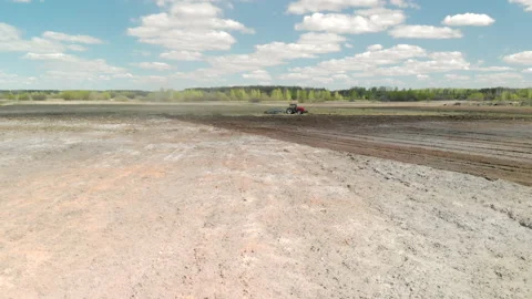 The farmer prepares the ground for sowing the future crop. Modern agribusiness Видео 132483750