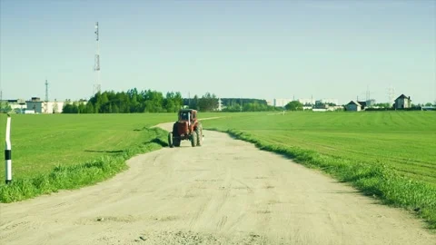 Farmer rides a tractor. Stock Footage 88450523