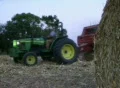 Farmer Round Baling Hay Footage