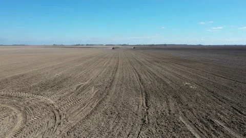 Farmer seeding crops at field 스톡 동영상 128276749