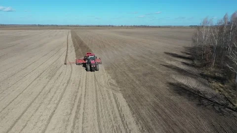 Farmer seeding crops at field. Seeding Aerial View. Stockbeeldmateriaal 126748307