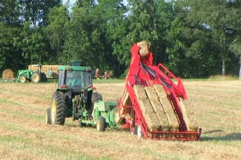 Farmer Square Baling Hay Stock Footage 2763918