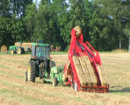 Farmer Square Baling Hay Stock Footage 2836750