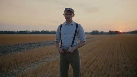 Farmer standing and looking at camera Stock Footage 113177981